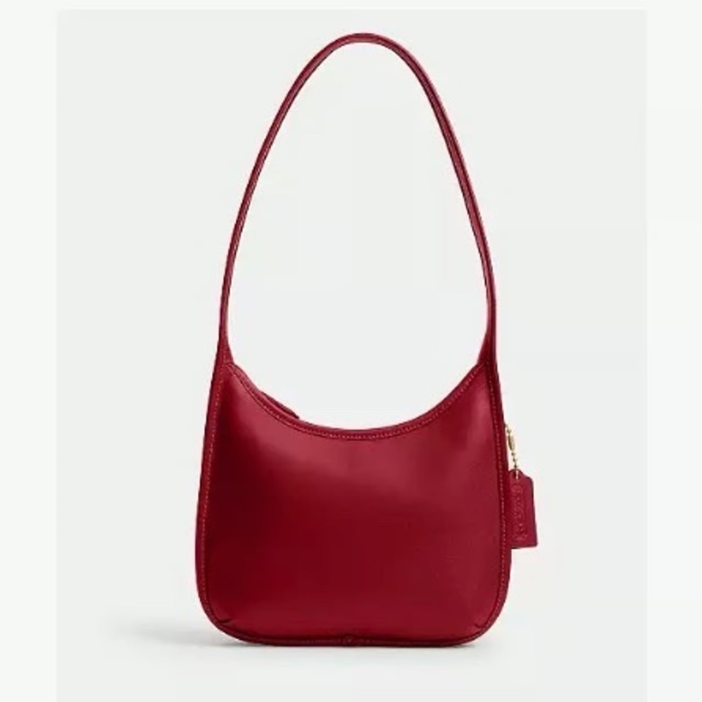 NWOT Coach Curve Zip Red
